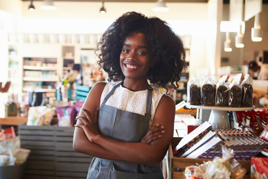 Female Employee Working in Delicatessen